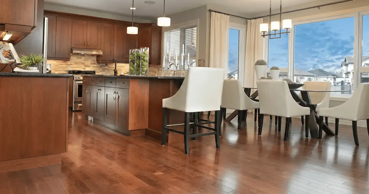 A modern kitchen with professionally installed wood flooring in South Bend, IN