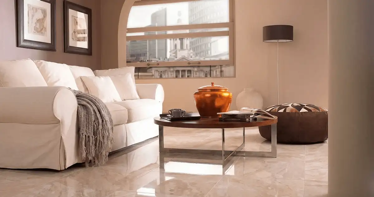 Modern living room with professionally installed marble flooring, a beige sofa, coffee table in South Bend, IN