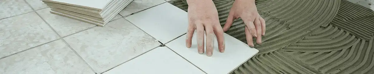 Professional installing white tile floors in South Bend, IN