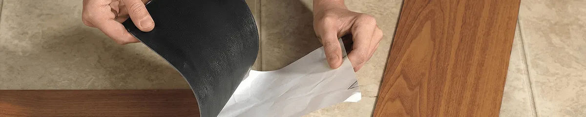 A professional installing vinyl flooring in South Bend, IN